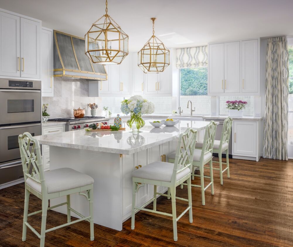 Brushed nickel faucet and unique drawer pulls adding sophistication to a kitchen