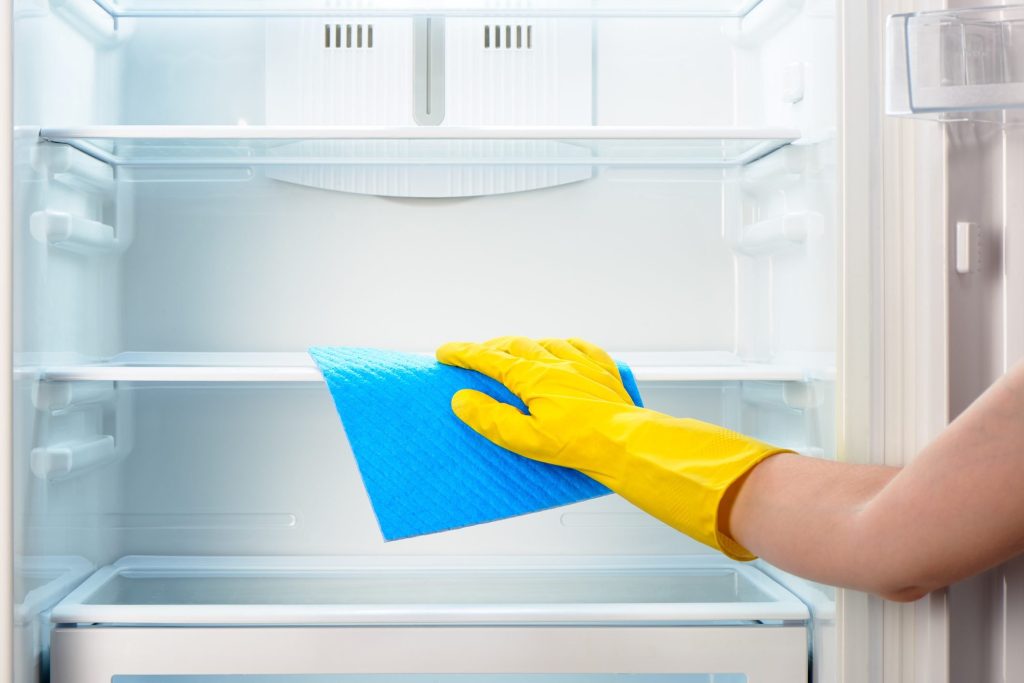 The vinegar and water will remove not just sticky mess and germs, but fridge smells, too. Bethliving