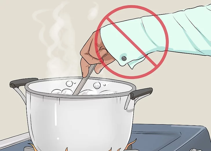 Not wearing loose clothing while cooking